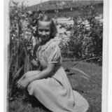 DutkiewiczLeone_KneelingByGarden