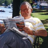 BirdCarroll_ReadingPaper Carroll Bird Reading Paper