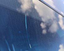 2025_EdbergSuburbanCrackedWindow1