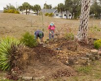 2026_TLC_Entrance_P1-05 Look at that very large spikey agave... Took a TEAM EFFORT to dig and re-locate that one!